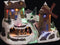 Kerstdorp - Kersthuisje met verlichting - Windmolen + Dorp - 15 LED