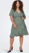 ONLY CARMAKOMA CARLIVIA - Wrap dress - V-hals met ruffle - Chinois green met stippen