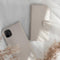 Selencia Hoesje Geschikt voor iPhone 11 Pro Hoesje Met Pasjeshouder - Selencia Echt Lederen Bookcase - Lichtgrijs