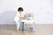 Smoby Baby Care Zorgcentrum - Dokter - Inclusief accessoires - Groen Roze Blauw Grijs