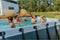 EXIT Wood zwembad 400x200x122cm met filterpomp - bruin