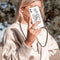 iMoshion Hoesje Geschikt voor iPhone Xr Hoesje Met Koord - iMoshion Design Hoesje met Koord - Zwart / Transparant / Woman Flower