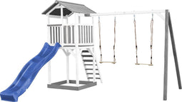 AXI Beach Tower Speeltoestel in Grijs/Wit - Speeltoren met Dubbele Schommel, Blauwe Glijbaan en Zandbak - FSC hout - Speelhuis op palen voor de tuin