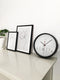 nXt - Stille Wandklok - 30 cm - Plastic - Zwart/Wit - 'Worldtour'