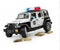 Bruder 02526 Jeep Wrangler Unlimited Rubicon Politieauto met Licht en Geluid 1:16