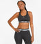 PUMA Feel It - Mid Impact Sportbeha Dames - DryCELL technologie - Zwart (M)