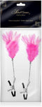 Tepelklemmen met roze veertjes