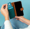 iMoshion Hoesje Geschikt voor iPhone 13 Mini Hoesje Met Pasjeshouder - iMoshion Luxe Canvas Bookcase - Groen