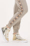Guess Elga - Hoge sneakers - Metallic leer met krokodillenprint - Goud