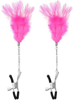Tepelklemmen met roze veertjes