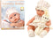 Babypop met draagbaar bedje - 35x17x8 cm - beweegbaar - educatief