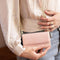 Selencia Hoesje Geschikt voor Samsung Galaxy S21 Hoesje Met Pasjeshouder - Selencia Eny Uitneembare Vegan Lederen Clutch - Roze