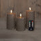 Anna Collection LED kaarsen/stompkaarsen set - 3x st - taupe grijs - swirl - afstandsbediening