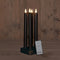 Anna's Collection Oplaadbare LED dinerkaarsen - 4x - zwart - 23,5 cm - afstandsbediening - oplaadstation