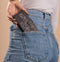 iMoshion Hoesje Geschikt voor Samsung Galaxy S10 Hoesje Met Pasjeshouder - iMoshion Design Softcase Bookcase - Wit / Zwart / Woman Flower Black