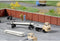 Auhagen 44658 N Vrachtwagen Multicar M22 laadbak met aanhanger voor lang materiaal