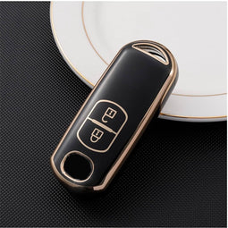 Autosleutel hoesje - TPU Sleutelhoesje - Sleutelcover - Autosleutelhoes - Geschikt voor Mazda -zw-goud- A2 - Mazda 6, Mazda 3, Mazda 2, Mazda MX-5, Mazda CX-30, Mazda MX-30, Mazda CX-5, Mazda CX-60 - Auto Sleutel Accessoires gadgets - Kado Cadeau ma