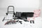 Smoby Maxi Cosi - Poppenwagen - 3 in 1 - Roze