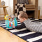 BABY EINSTEIN Speelgoed op wielen Kleine olifant - Muziek en licht - Interactief en meertalig - Ontwikkeling van motorische vaardigheden
