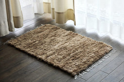 Beige Woven Sheepskin Rug