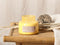 Beliani DELIGHT BLISS - Geurkaars - Gouden appel - Soja wax