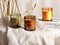 Beliani SHEER JOY - Geurkaars set - Gouden appel/Chocolade/Amber - Soja wax