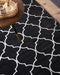 Beliani YELKI - Laagpolig vloerkleed - Zwart - 160 x 230 cm - Viscose
