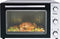 Bestron vrijstaande Mini Oven met 31L volume, Bakoven inlcusief Grillrooster, Draaispit, Bakschaal & Heteluchtfunctie, met 5 programma’s tot max. 230 °C, timer & indicatielampje, 1500 Watt, kleur: zilver / zwart
