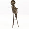 BRONZEN SCULPTUUR GENAAMD -ZITTEND AAN DE BAR-
