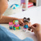 Gabby's Poppenhuis - Kattenverzorging Speelfigurenset met Gabby 2 katjes en 1 poppenhuispakketje
