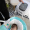 BABY EINSTEIN Ocean Explorers schommel, licht en compact - 180° draaibare stoel - Inclusief speelgoed - Curious Comfort-model