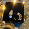 Creolen met 3 beige en gouden kristallen