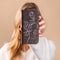 iMoshion Hoesje Geschikt voor iPhone SE (2022) / SE (2020) / 8 / 7 Hoesje Met Pasjeshouder - iMoshion Design Softcase Bookcase - Wit / Zwart / Woman Flower Black