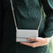 Selencia Hoesje Geschikt voor iPhone 11 Hoesje Met Pasjeshouder - Selencia Eny Uitneembare Vegan Lederen Clutch - Grijs