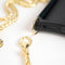 iMoshion Hoesje Geschikt voor iPhone Xs / X Hoesje Met Koord - iMoshion Sparkle Backcover met ketting - goud