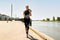 Mobiparts iPhone 14 Pro Max - Sport Belt - Water- en zweetbestendig - Zwart