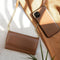 Selencia Hoesje Geschikt voor iPhone 12 Mini Hoesje Met Pasjeshouder - Selencia Eny Uitneembare Vegan Lederen Clutch - Bruin