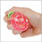 Glitter aardbei knijpbal 6cm 4ass