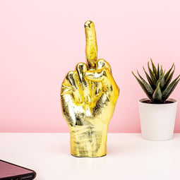 Gouden middelvinger beeldje - Bitten Design