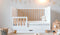 Hypnia - Baby Bed - Cocoon Babybed - Peuterbed - Babybed 60 x 120 - Met Opberglade - Spijlen + Bedhek - Lattenbodem - Bedbodem - Wit Hout - Eenvoudige Montage - Goed Verstevigd - Tijdloze Bedbodem - Geschikt Voor Ieder Matras