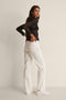 NA-KD Wide Leg Raw Hem - Dames Jeans - Maat 36 - Gebroken wit