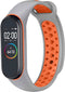 iMoshion Bandje Geschikt voor Xiaomi Mi Band 3 / 4 / Oranje - iMoshion Siliconen sport band met inkliksysteem ronde drukknoop - Grijs