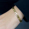 CO88 Collection 8CB-90094 - Bangle met hartjes - one-size - goudkleurig