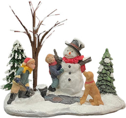 Kinderen Bouwen Sneeuwpop
