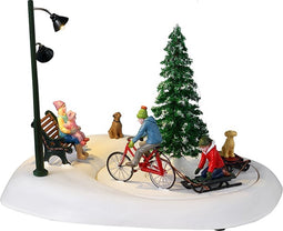 Lemax - 'Snowbiking With Dad' - Figuur met animatie - Exclusief adapter (werkt ook op batterijen)