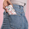 iMoshion Hoesje Geschikt voor iPhone 12 Mini Hoesje Met Pasjeshouder - iMoshion Design Softcase Bookcase - Wit / Roze / Blossom Watercolor