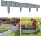 Tuinhek, kunststof, grijs, tuinrand in steenlook, gazonrand maairand, palissade, tuin, bloembed, pla