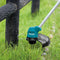 Makita UR100DWAE grass trimmer with battery and charger