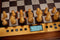 MILLENNIUM The King Performance - Schaakcomputer met adaptieve speellevels. Met frame van echt hout, houten stukken en 81 LEDS voor zetindicatie.