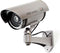 Nedis Dummy Beveiligingscamera - Bullet - IP44 - Batterij Gevoed - Buiten - Inclusief muurbeugel - Grijs